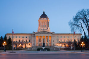 Photo of the Manitoba legislative building at dusk