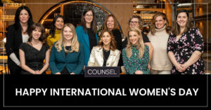 A photo of eleven women who are part of the Counsel team. Below the photo is the Counsel logo and the words "Happy International Women's Day" in white text on a black backdrop.