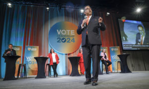 Alberta NDP leadership candidate Naheed Nenshi, right, makes an opening statement as fellow candidates, left to right, Gil McGowan, Jodi Calahoo Stonehouse, Sarah Hoffman, and Kathleen Ganley look on during a leadership debate in Calgary, Alta., Saturday, May 11, 2024. Results of the leadership race are to be announced Jun. 22
