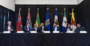 Northwest Territories Premier R.J Simpson, from left, Saskatchewan Premier Scott Moe, Manitoba Premier Wab Kinew, Yukon Premier Ranj Pillai, British Columbia Premier David Eby, Alberta Premier Danielle Smith and Nunavut Premier P.J. Akeeagok chat at the conclusion of a media availability at the 2024 Western Premiers’ Conference in Whitehorse, Monday, June 10, 2024. CANADIAN PRESS/Crystal Schick