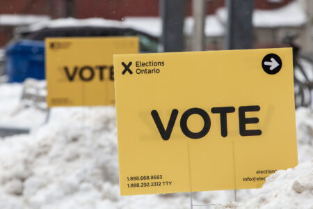 Signage from Elections Ontario, the non-partisan office of the Legislative Assembly of Ontario responsible for administering provincial elections, is seen at a polling station in Toronto, Thursday, Feb. 20, 2025. THE CANADIAN PRESS/Giordano Ciampini