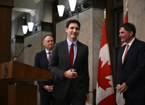 Prime Minister Justin Trudeau leaves after addressing media following the imposition of a raft of tariffs by U.S. President Donald Trump against Canada, Mexico and China, in Ottawa, Saturday, Feb. 1, 2025. Tariffs of 10 per cent on Canadian energy and 25 per cent on everything else will begin on Feb. 4. THE CANADIAN PRESS/Justin Tang