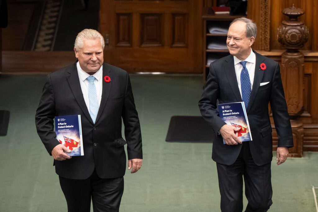 Ontario Premier Doug Ford and Finance Minister Peter Bethlenfalvy arrive at the legislature for the tabling of the 2025 Ontario Economic Outlook and Fiscal Review at Queen’s Park, in Toronto, Nov. 6, 2025. THE CANADIAN PRESS/Eduardo Lima